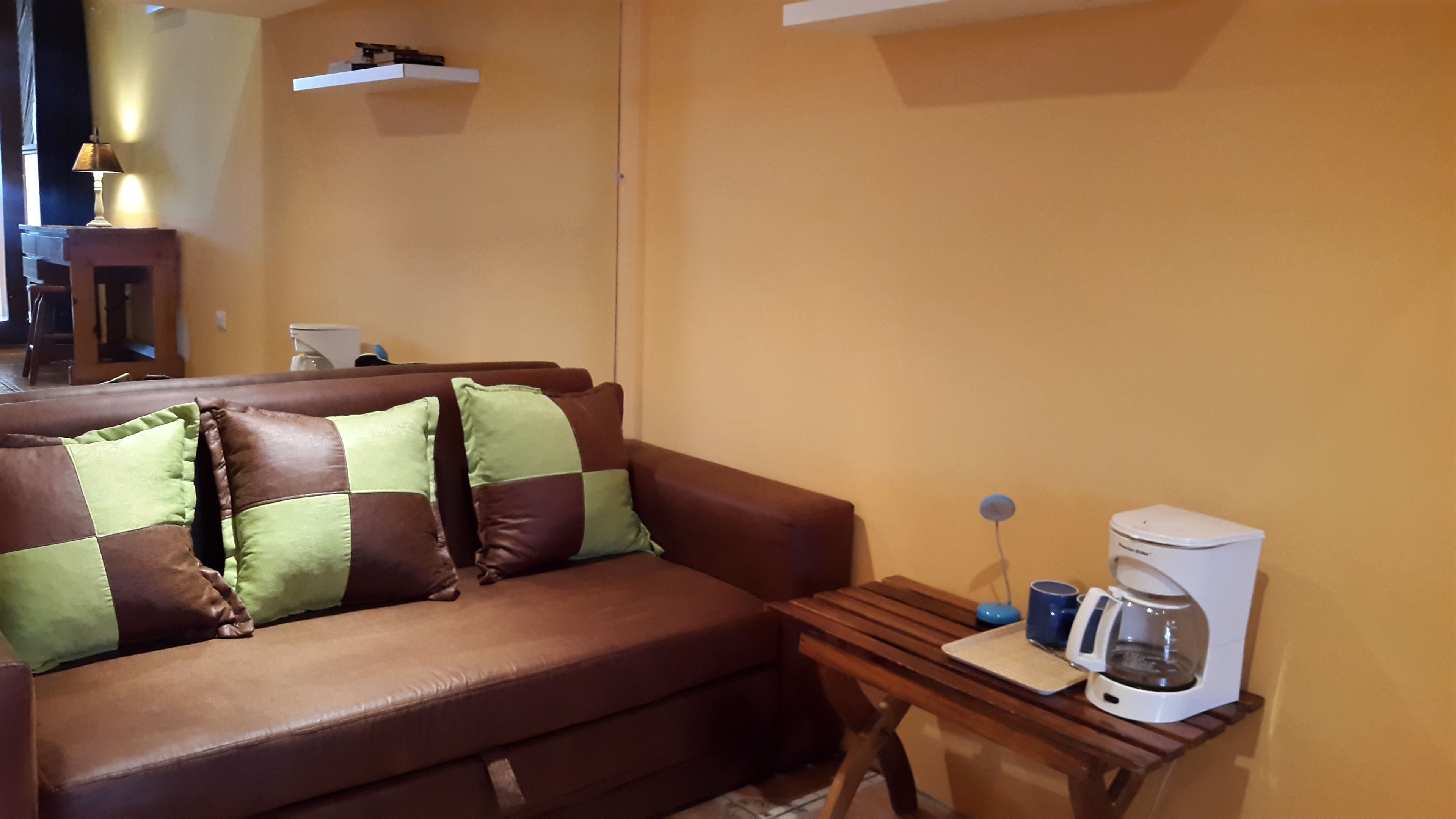 standard room with sea view | living room | flat-screen tv