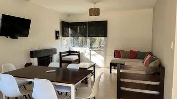 Premium Cabin | Living area | 43-inch Smart TV with satellite channels, TV, table tennis