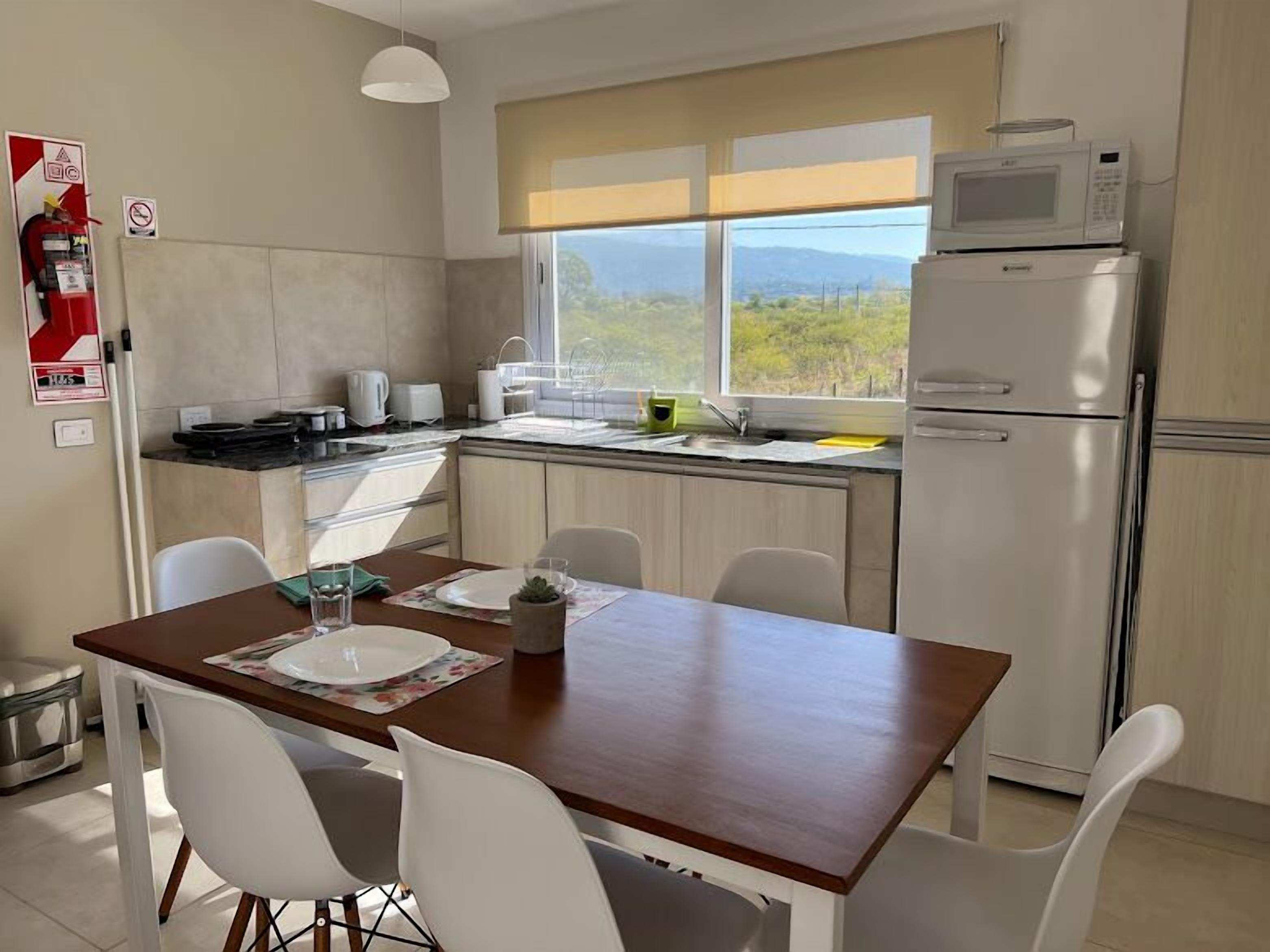 Comfort Apartment | Private kitchen | Microwave, electric kettle, toaster, cookware/dishes/utensils