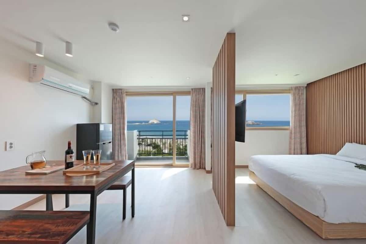 Premium bedding, blackout drapes, soundproofing, free WiFi