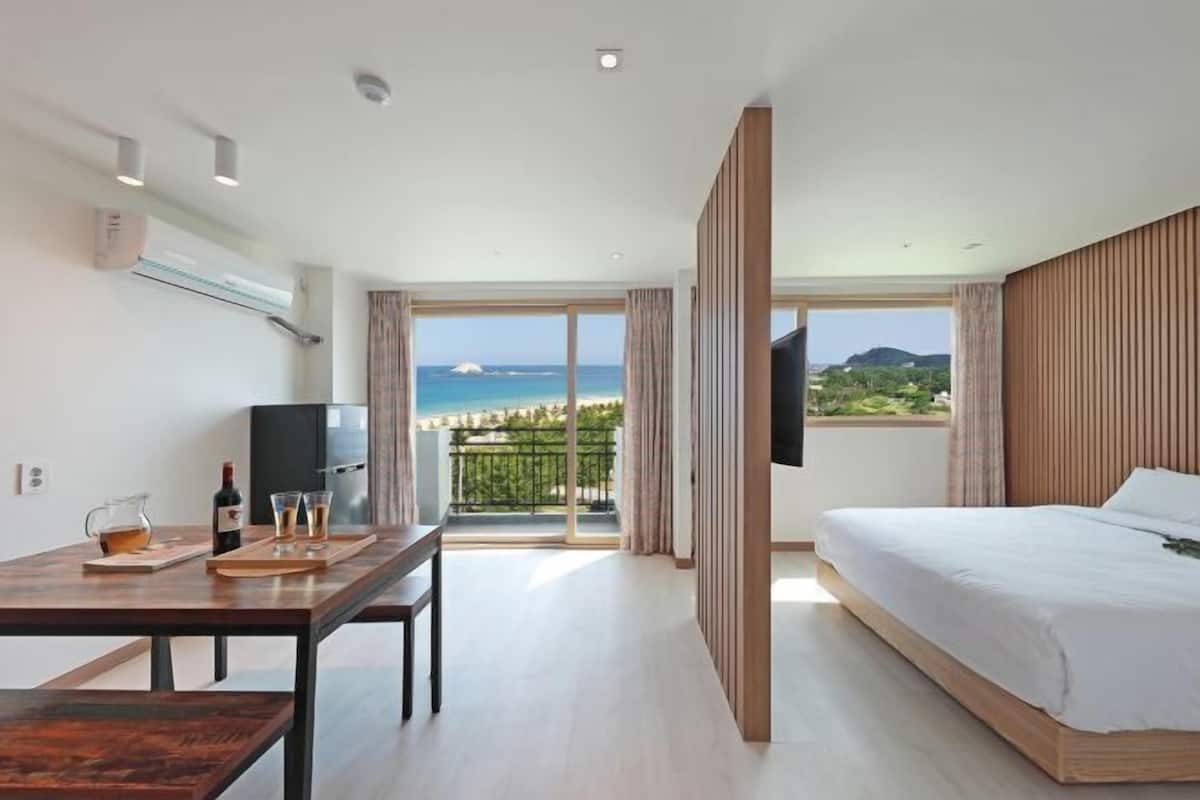 Premium bedding, blackout drapes, soundproofing, free WiFi
