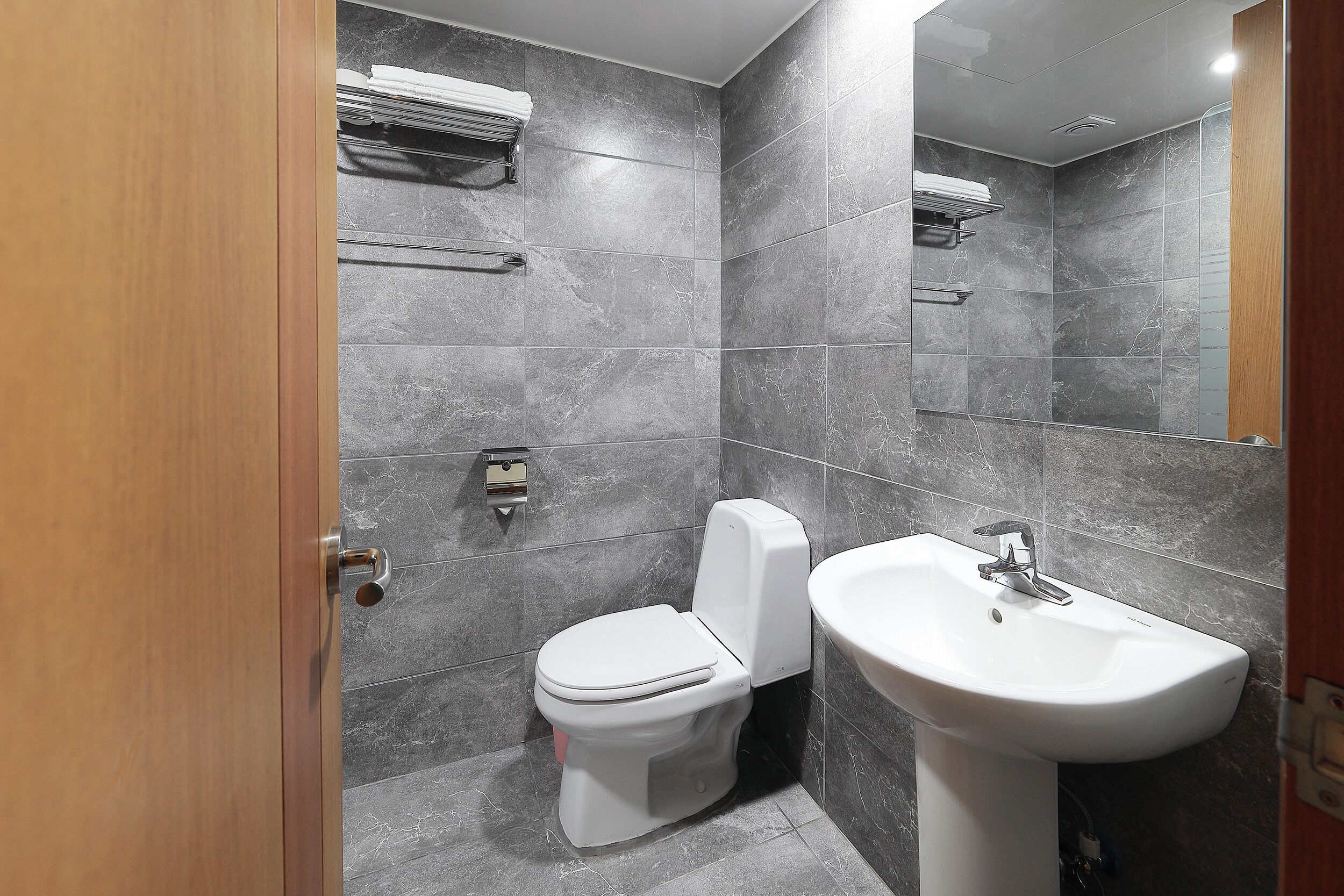 shower, designer toiletries, hair dryer, slippers