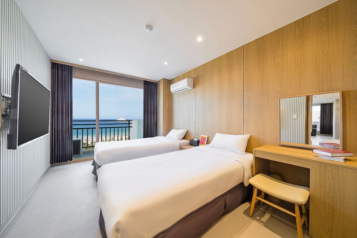 Premium bedding, blackout drapes, soundproofing, free WiFi