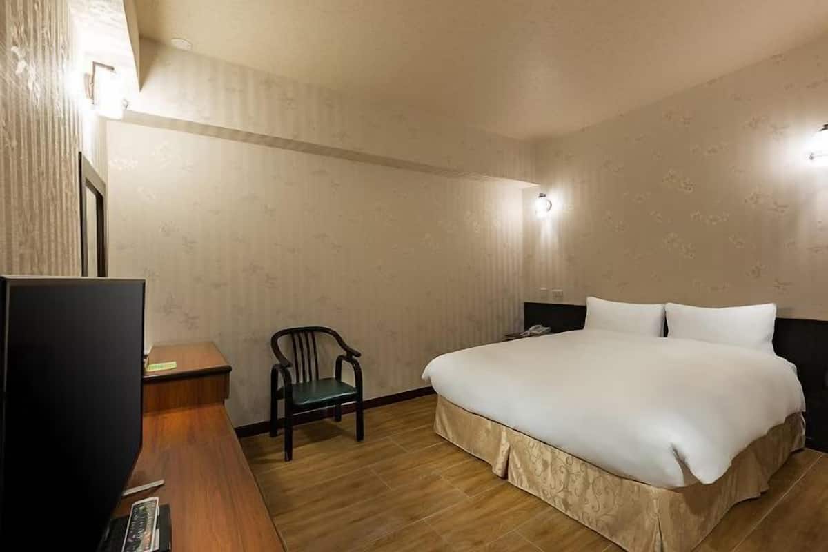 Desk, blackout curtains, free WiFi, bed sheets