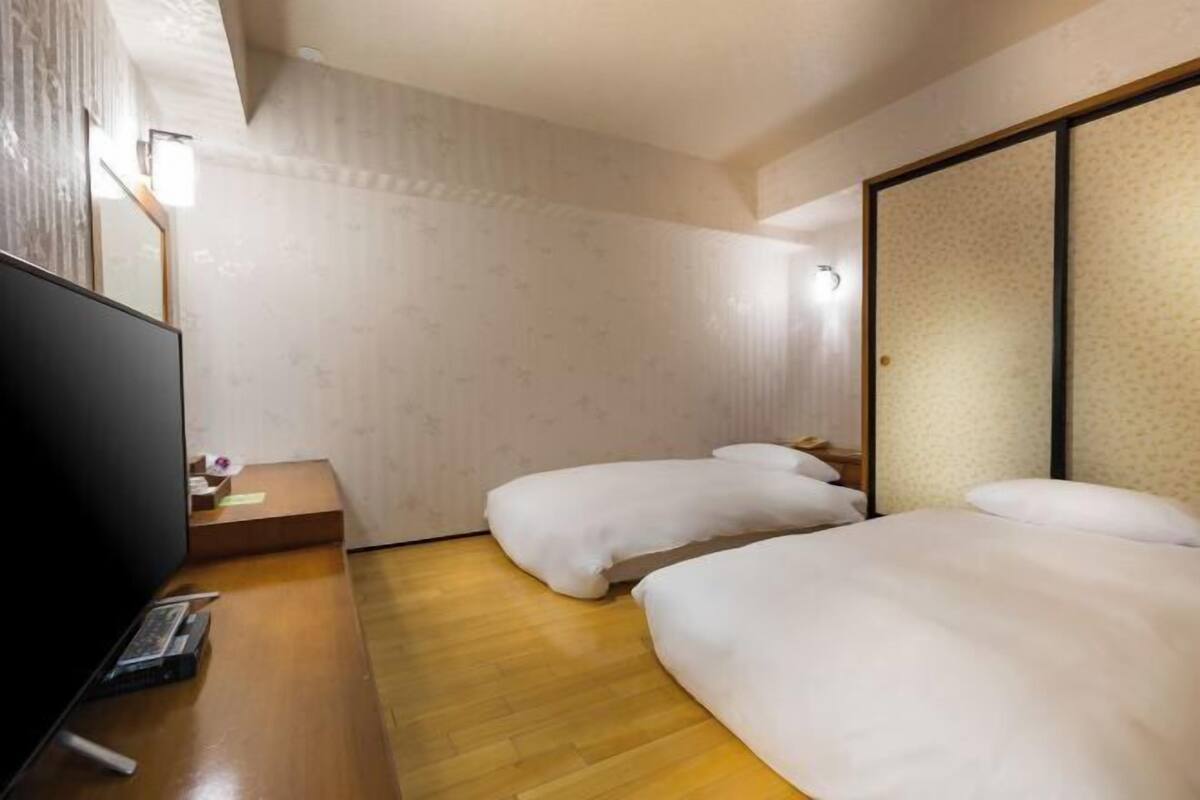 Desk, blackout curtains, free WiFi, bed sheets