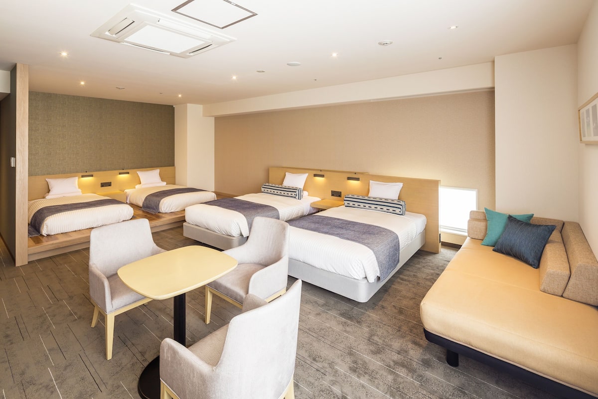 Deluxe Quadruple Room (4 Twin Beds) | In-room safe, iron/ironing board (on request), free WiFi