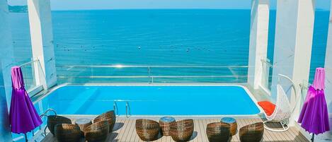 Outdoor pool, pool umbrellas, pool loungers