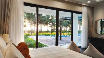 Villa, 3 Bedrooms, Beachfront | Minibar, in-room safe, desk, blackout curtains