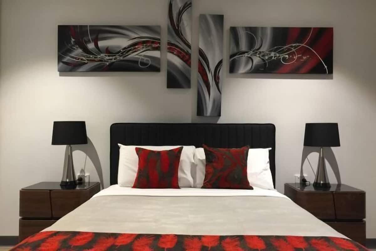 Premium bedding, memory foam beds, desk, laptop workspace