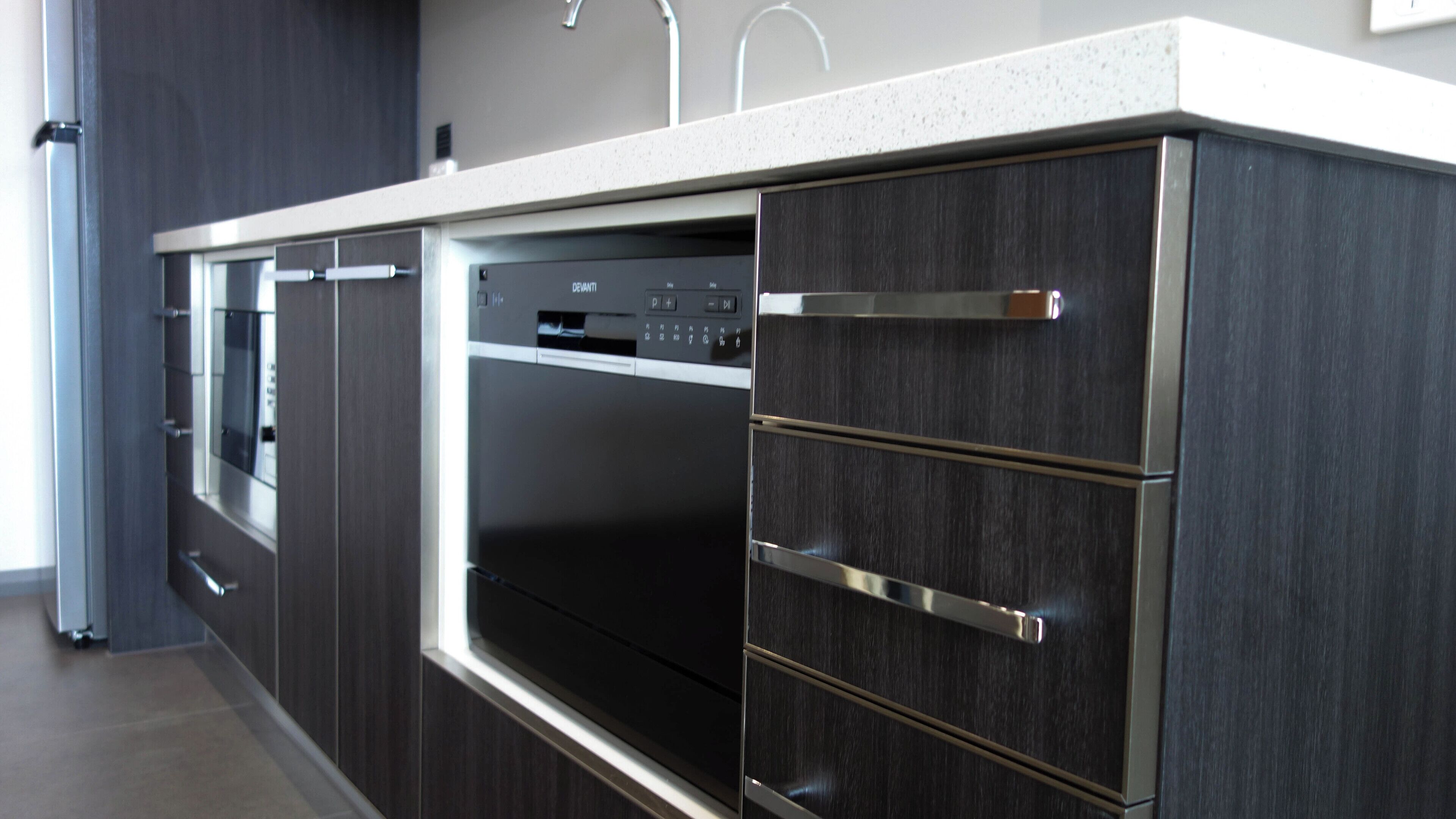 full-sized fridge, microwave, stovetop, dishwasher