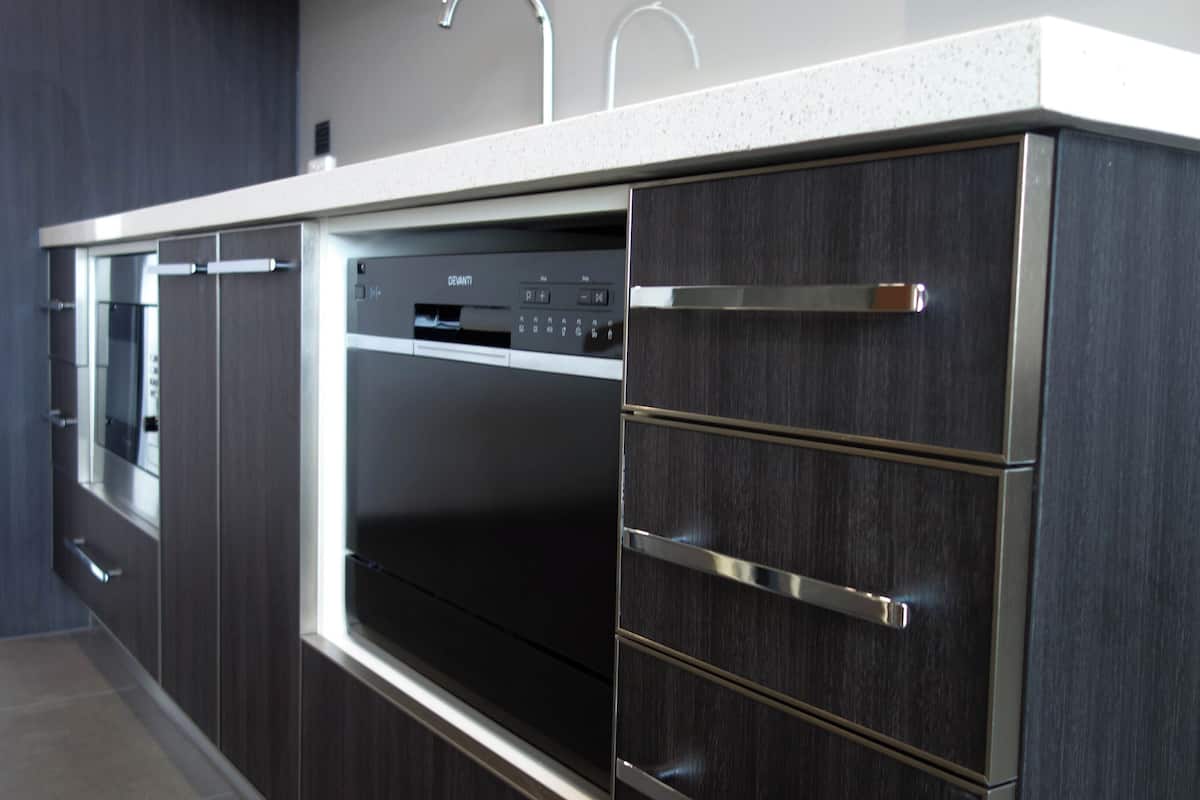 full-sized fridge, microwave, stovetop, dishwasher