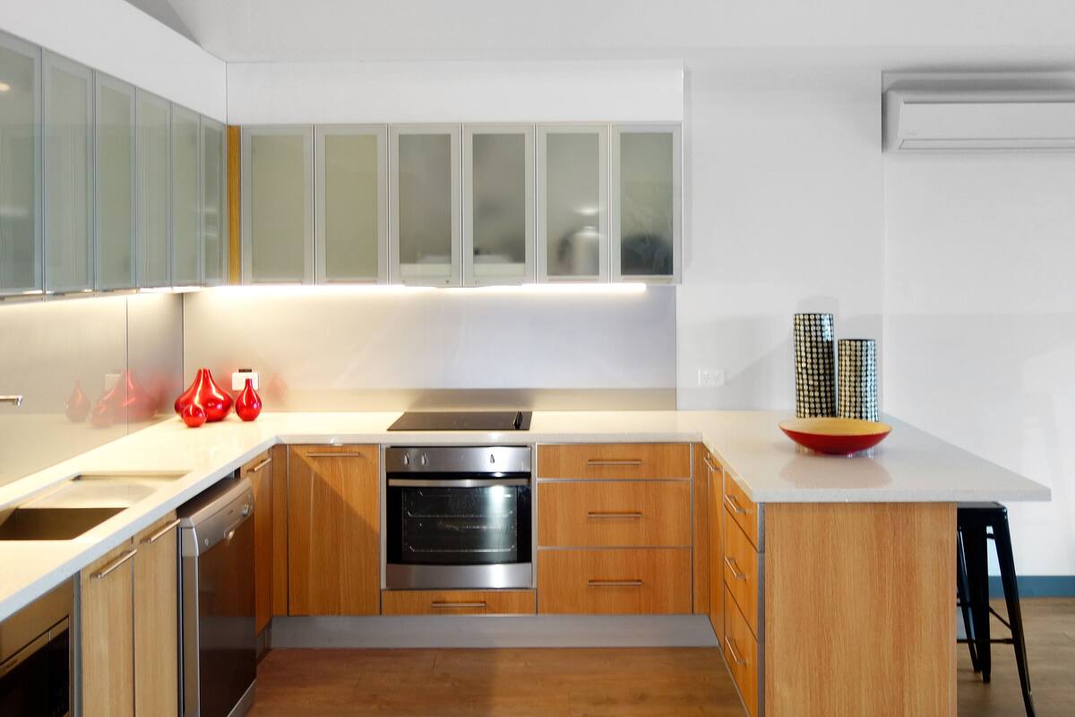 full-sized fridge, microwave, stovetop, dishwasher