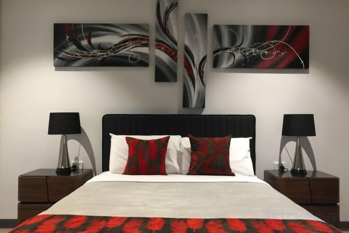 Premium bedding, memory-foam beds, desk, laptop workspace