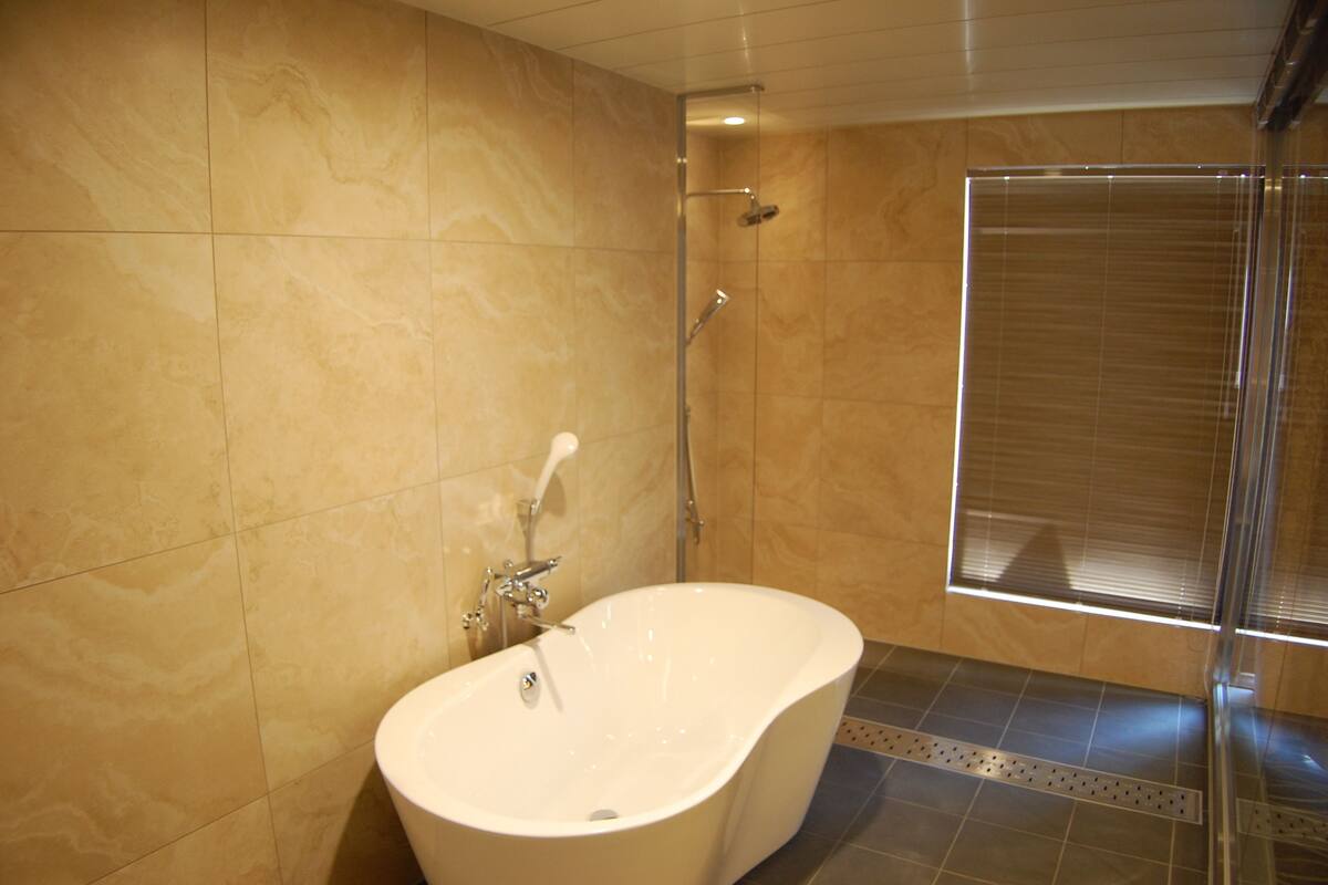 suite | bathroom | free toiletries, hair dryer, slippers, bidet