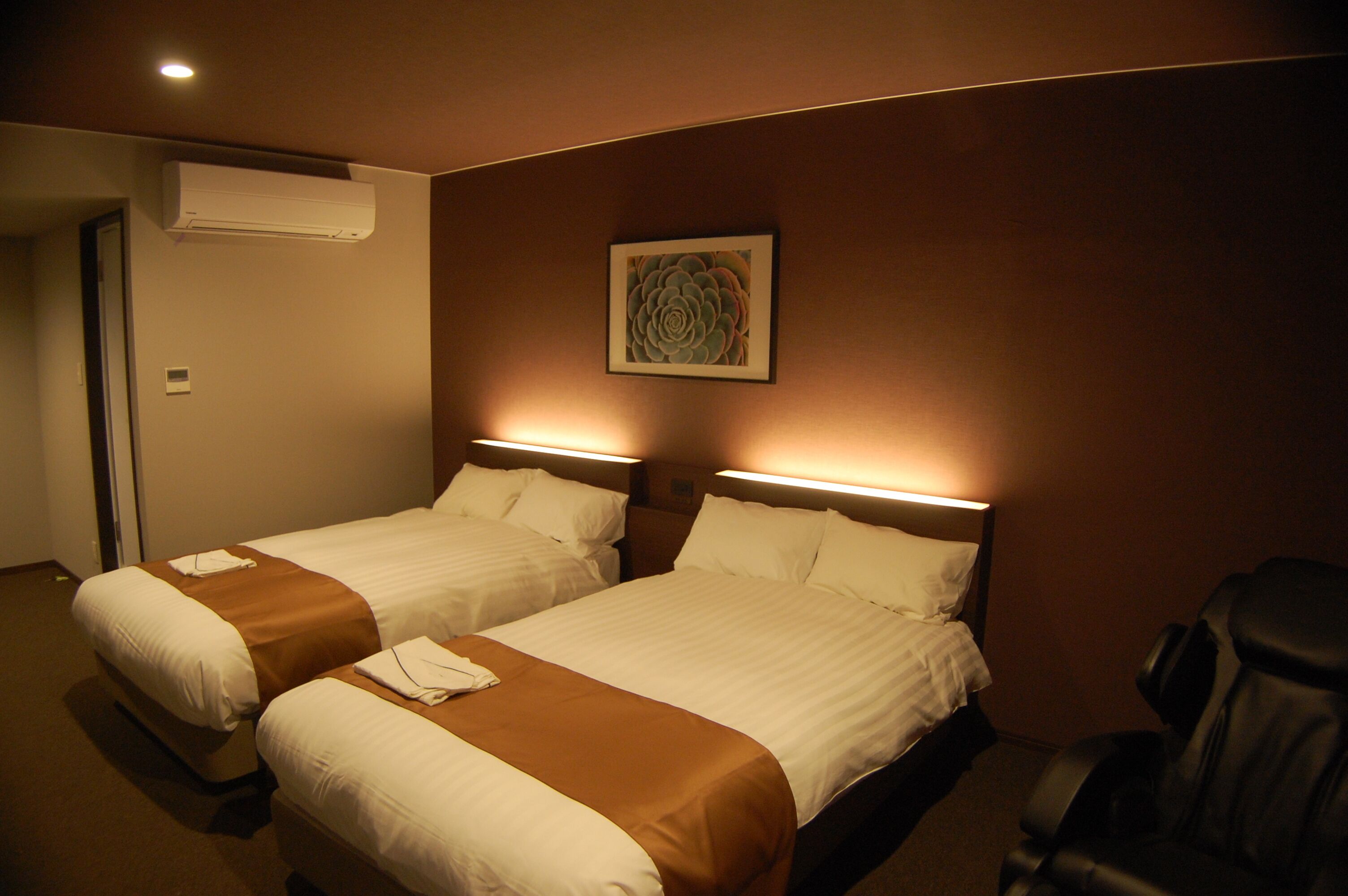 Premium bedding, pillow-top beds, desk, blackout curtains