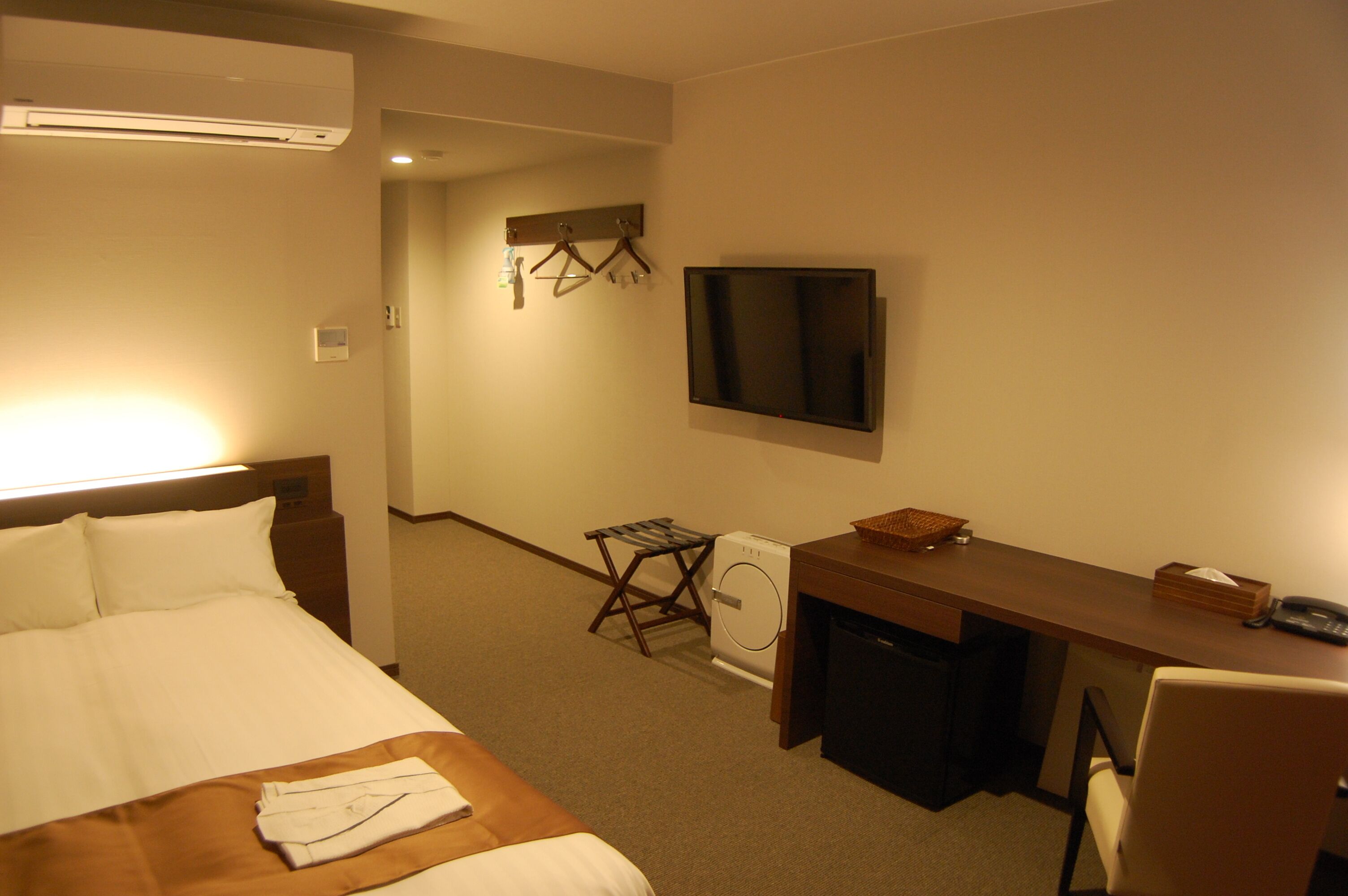 Premium bedding, pillow-top beds, desk, blackout curtains