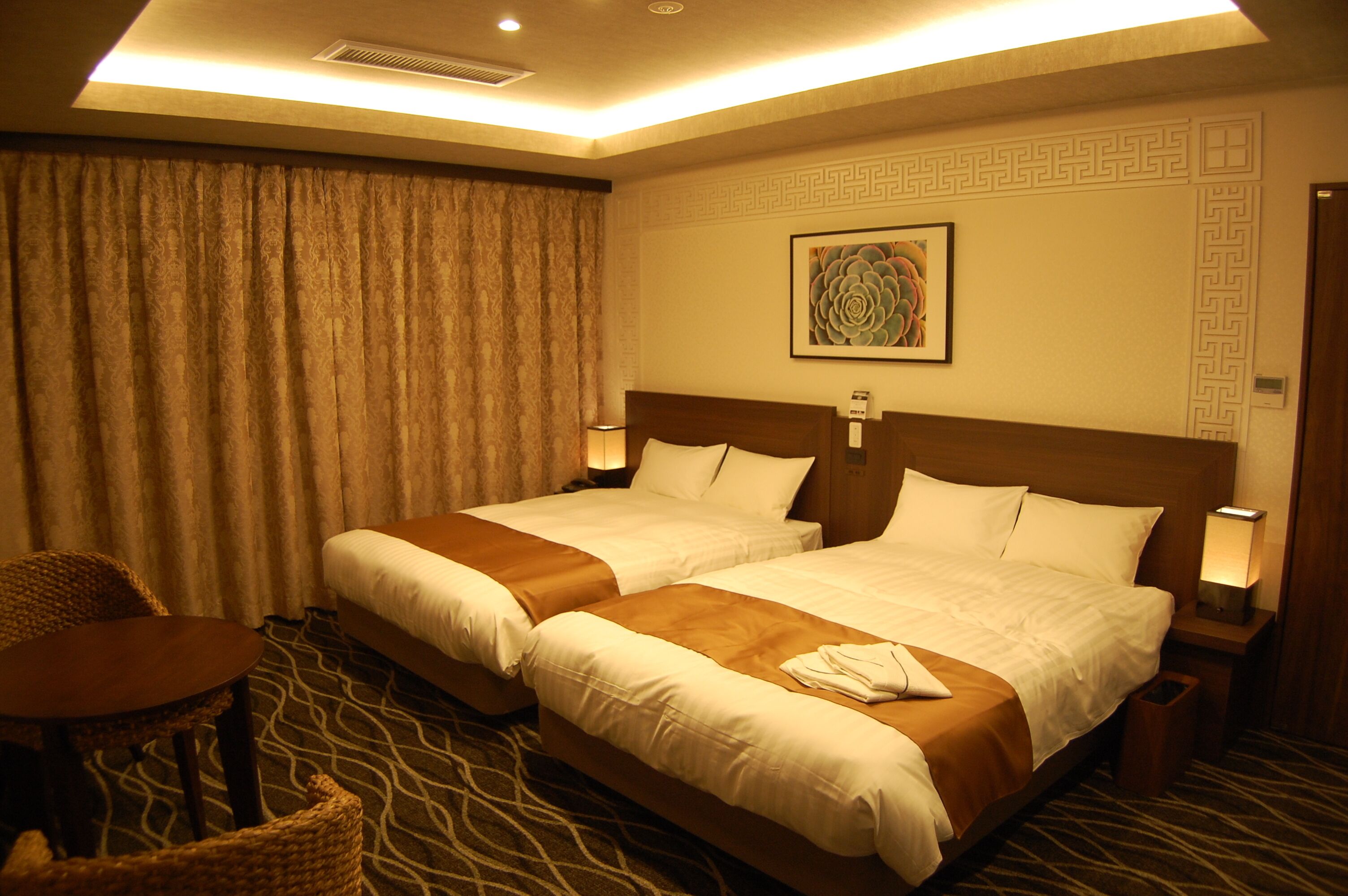Premium bedding, pillow-top beds, desk, blackout curtains