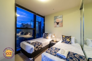 Apartamento família, 2 quartos, cozinha, vista para a cidade | 1 quarto, individualmente decorados, individualmente mobiliados