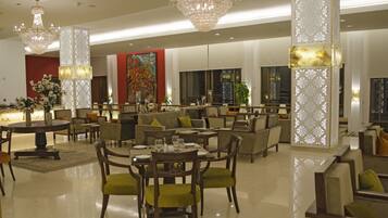 Breakfast, lunch, dinner served; local and international cuisine