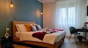 Deluxe tweepersoonskamer, balkon | Italiaanse Frette-lakens, luxe beddengoed, donzen dekbedden