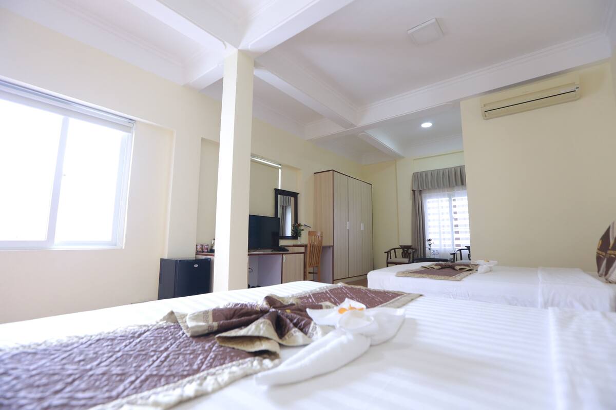 quadruple room, 2 queen beds, smoking, refrigerator | minibar, in-room safe, individually decorated, individually furnished