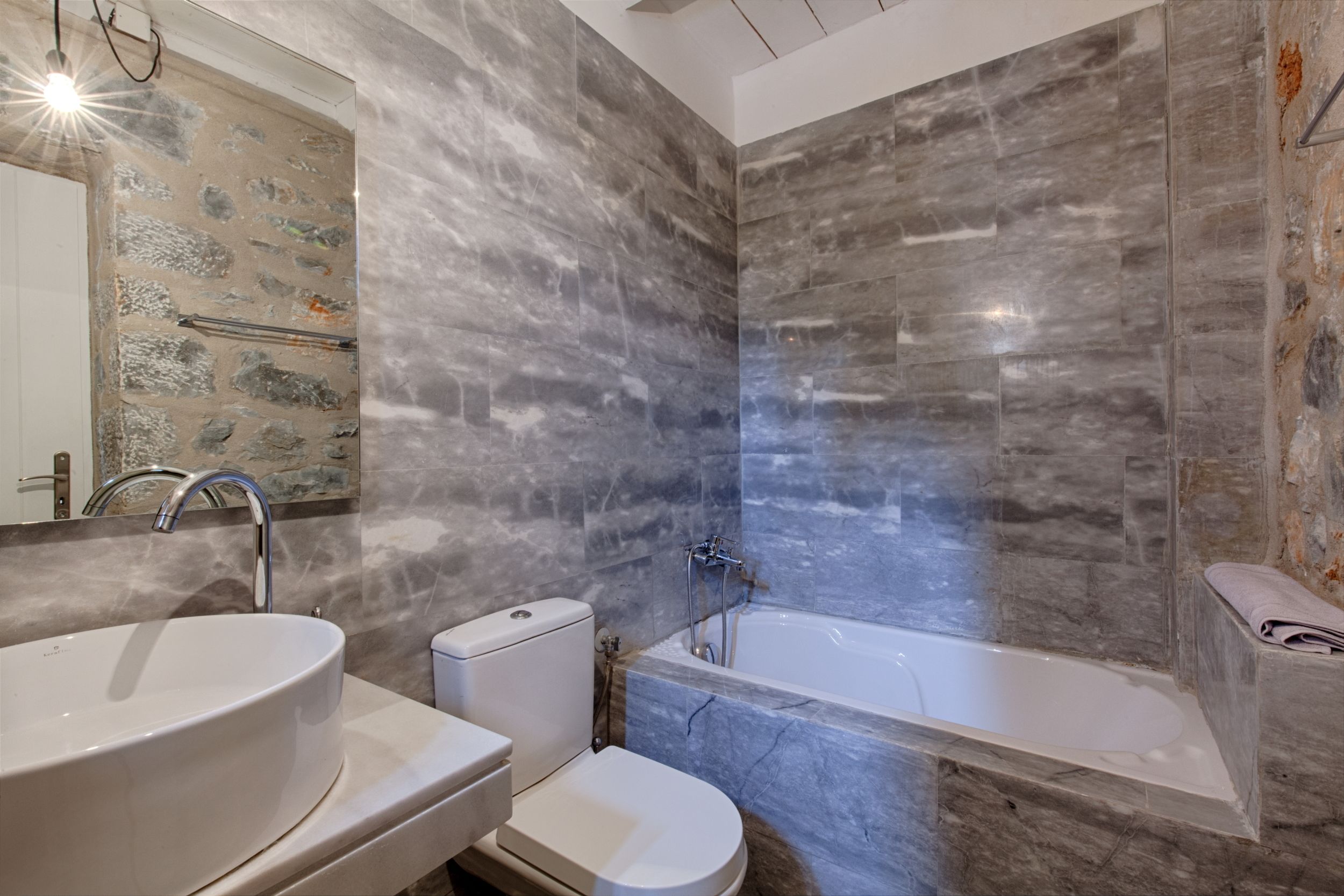 rainfall showerhead, designer toiletries, hair dryer, slippers