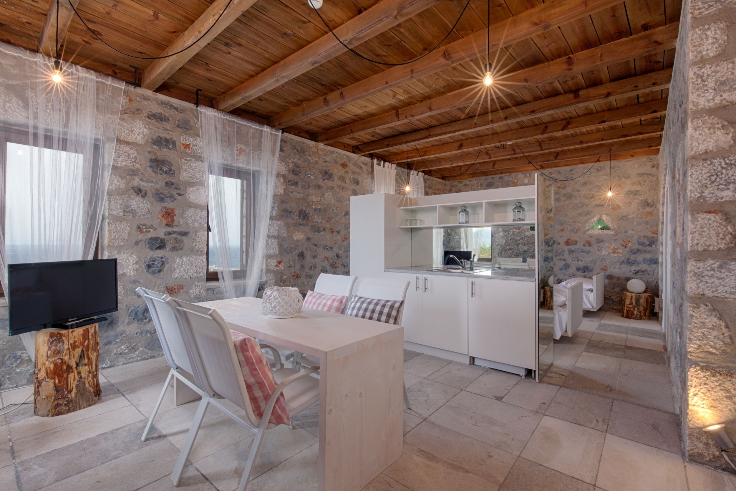 family suite, 2 bedrooms, sea view | living area | lcd tv