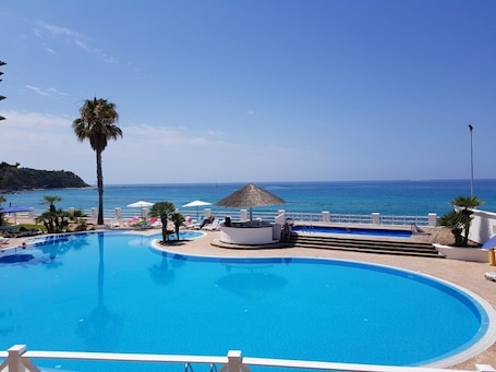 Outdoor pool. Cala Petrosa Resort