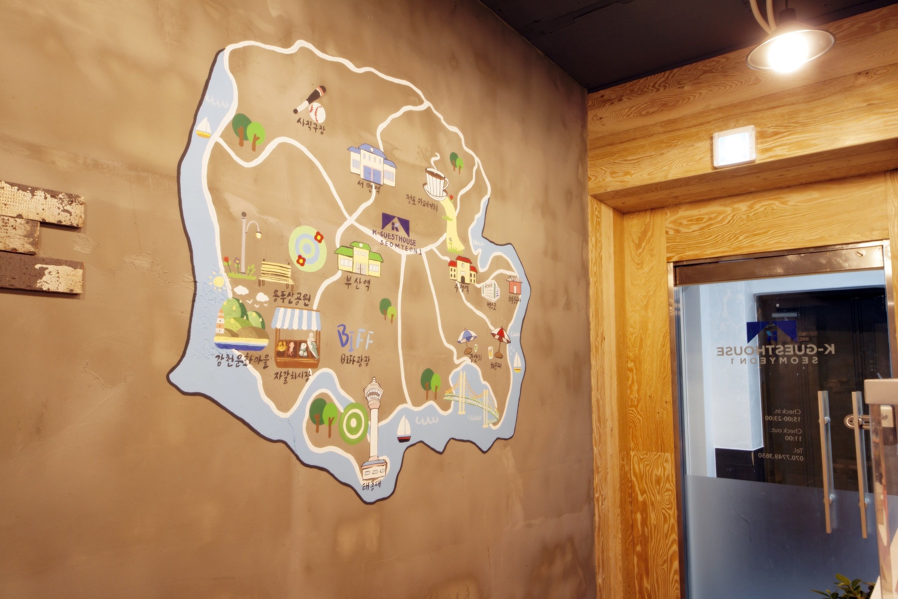 A wall map with various icons representing amenities and landmarks.