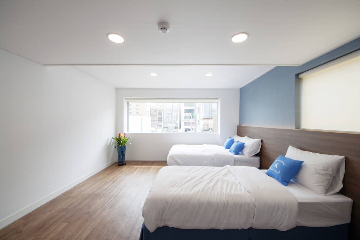 Habitación familiar | Decoración individual, cortinas opacas, sistema de insonorización