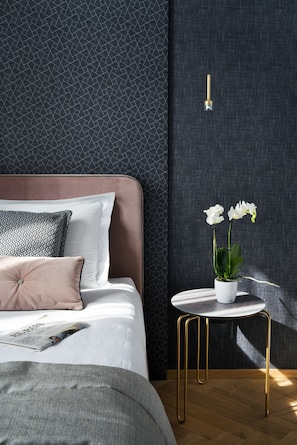 Premium bedding, down comforters, minibar, in-room safe