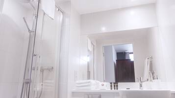 Shower, rainfall showerhead, designer toiletries, hair dryer