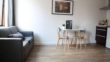 40-inch flat-screen TV with cable channels, TV