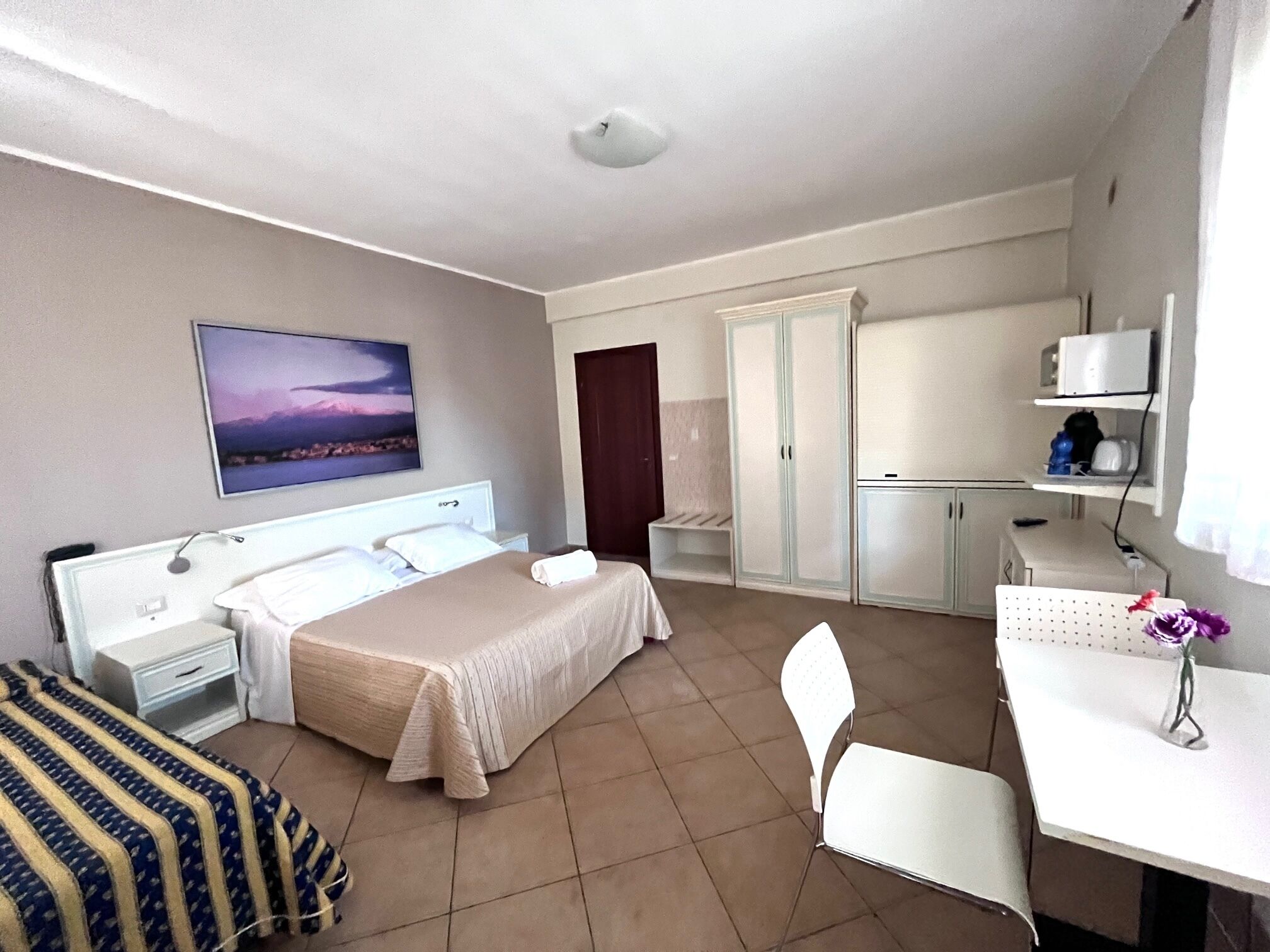 family studio, 1 queen bed with sofa bed, kitchenette, sea view | 1 bedroom, down duvets, in-room safe, blackout curtains