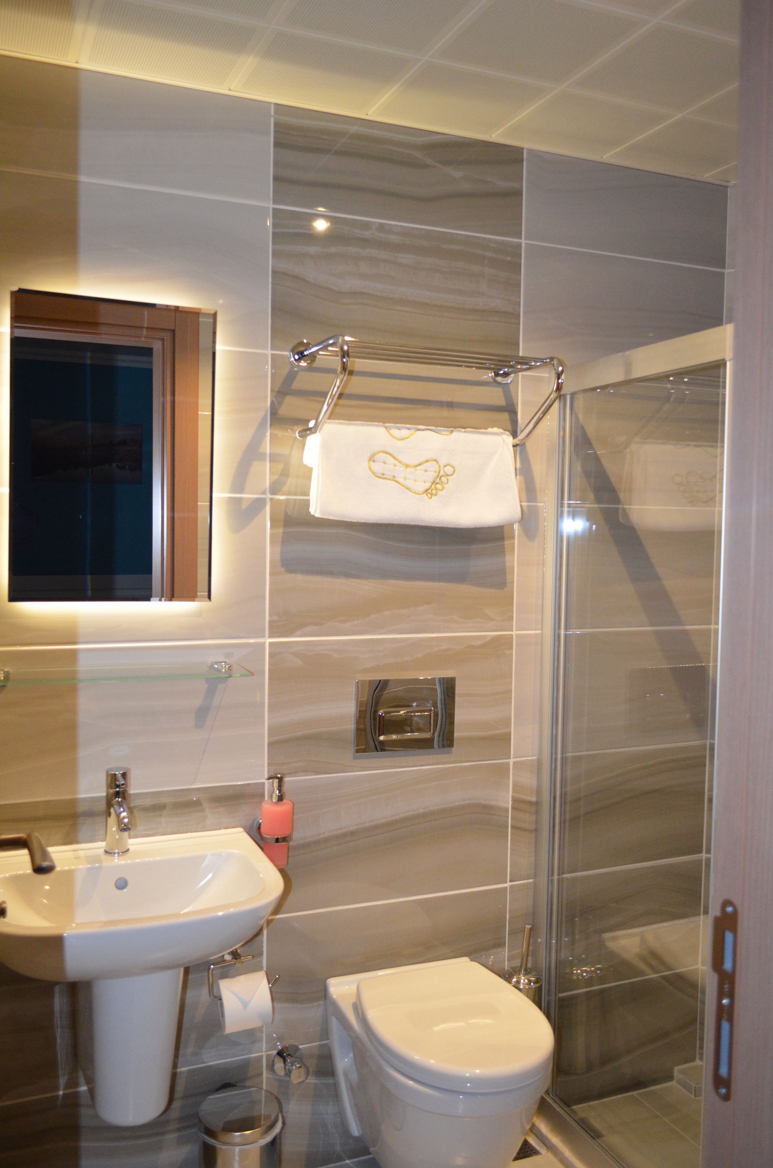 shower, free toiletries, hair dryer, slippers