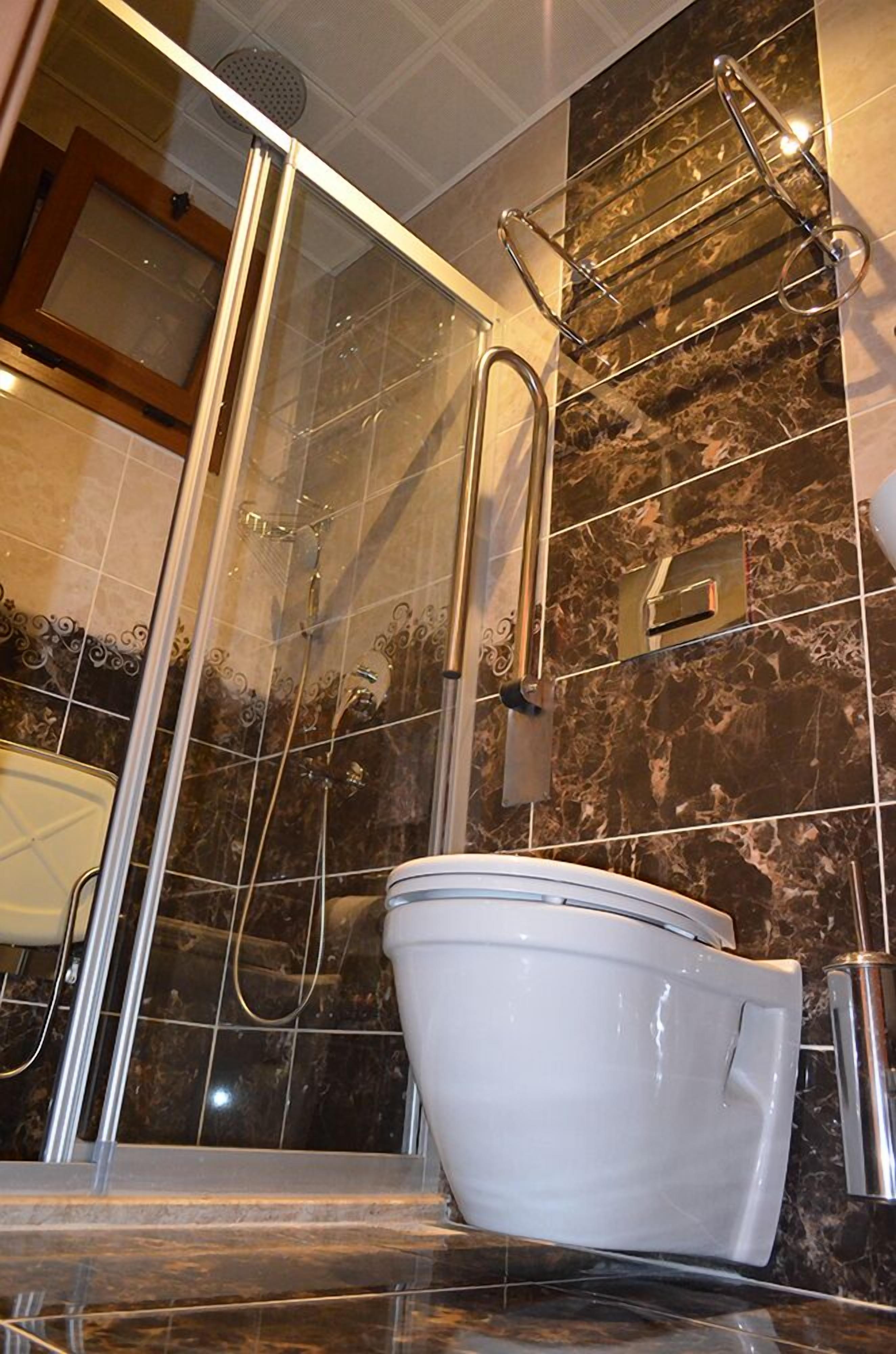 shower, free toiletries, hair dryer, slippers