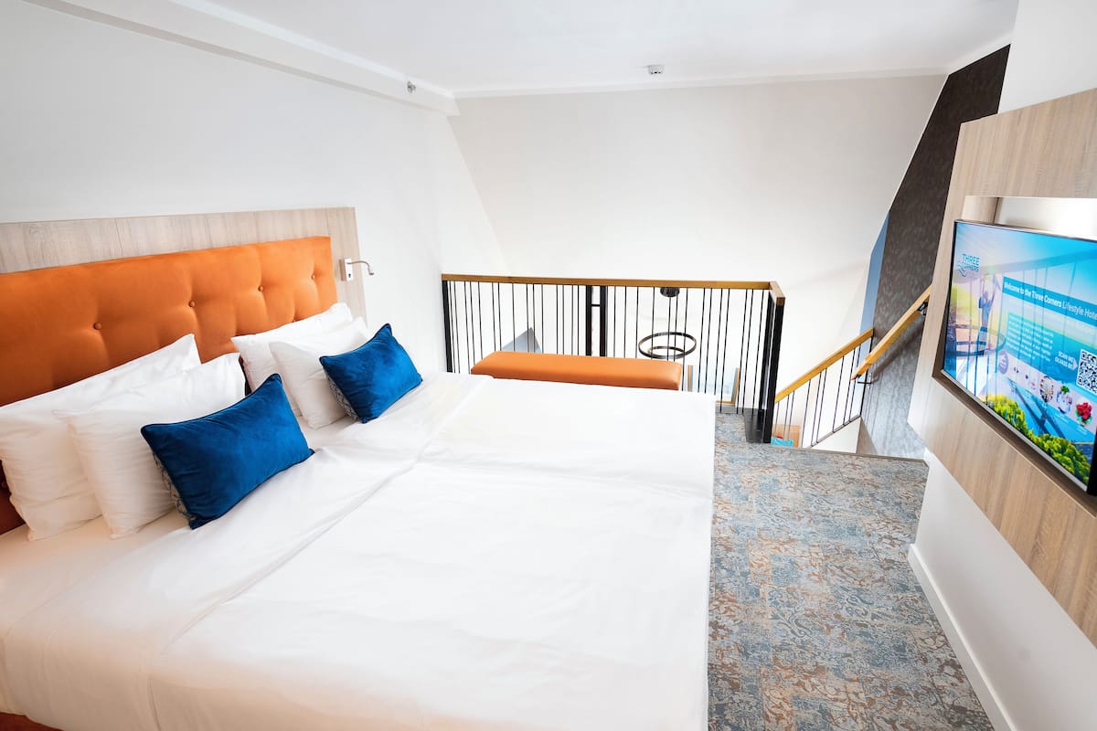 Duplex Dream Suite | 1 dormitorio, ropa de cama hipoalergénica, minibar y caja fuerte