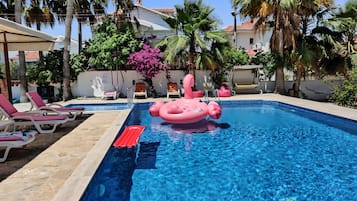 Outdoor pool, open 10:00 AM to 8:00 PM, pool umbrellas, sun loungers