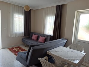 ห้องสแตนดาร์ดสวีท, วิวสวน | 1 ห้องนอน, เครื่องนอนระดับพรีเมียม, ตู้นิรภัยในห้องพัก