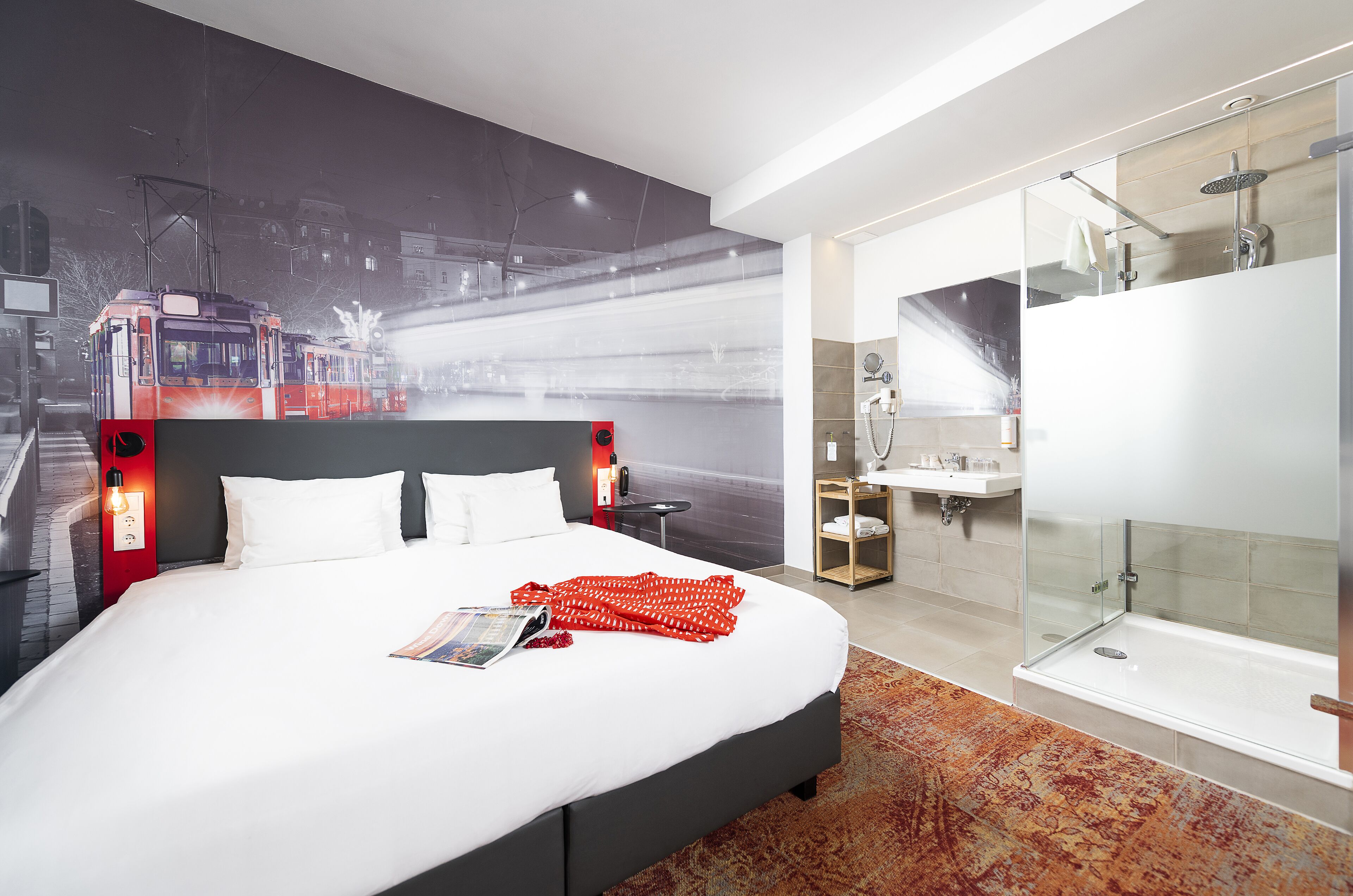 superior double room with sofa bed | bathroom | shower, eco-friendly toiletries, hair dryer, towels