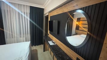 Ropa de cama de alta calidad, minibar y sistema de insonorización