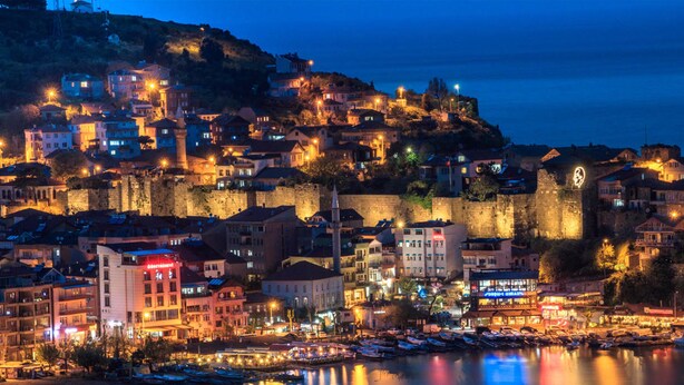 A historic town with a fortified hilltop, waterfront, and various buildings including hotels and restaurants. - Amasra Ceylin Hotel (Amasra)