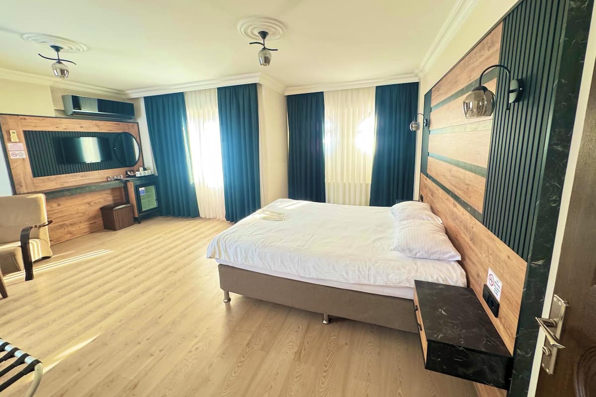 Family Süit, Sigara İçilmez, Balkon | Kaliteli yatak takımı, minibar, ses yalıtımı, ütü/ütü masası 