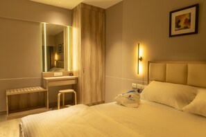Family Room | Premium bedding, minibar, desk, free WiFi - Ashok Deluxe Apartments (Mumbai)