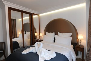 Ropa de cama de alta calidad y minibar 