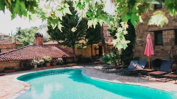 Outdoor pool, open 10:00 AM to 7:00 PM, pool umbrellas, sun loungers