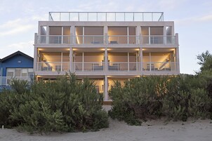 On the beach, sun loungers, beach towels, snorkeling