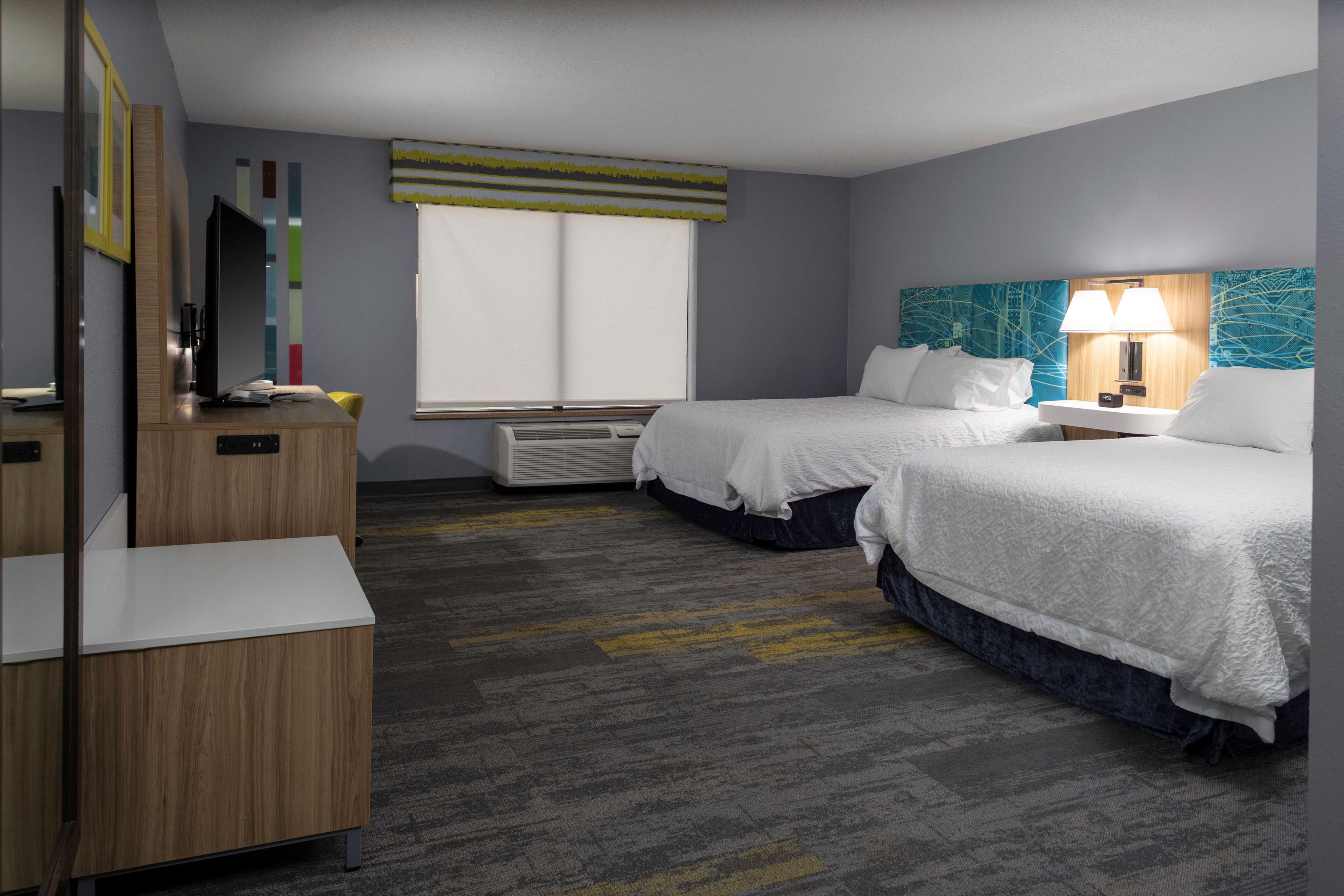 desk, blackout curtains, iron/ironing board, free cots/infant beds