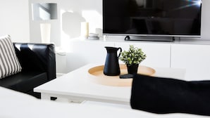 Departamento, 2 habitaciones | Área de sala de estar