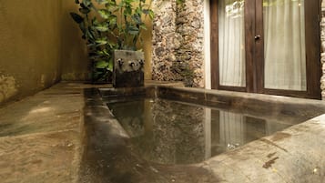 Premium bedding, down comforters, pillowtop beds, in-room safe